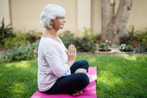 caregiver meditating on break