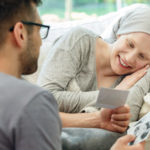 family talking to hospice patient