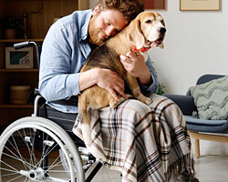 male patient with therapy dog