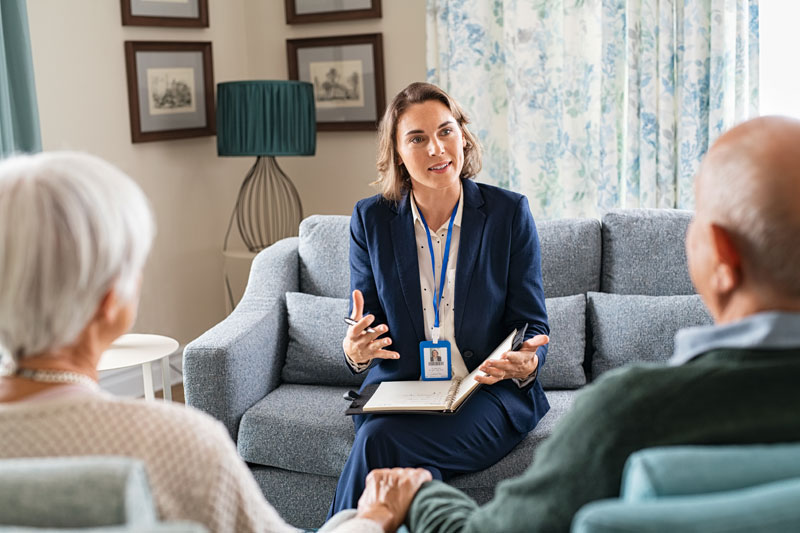 hospice social worker talking to patient's family